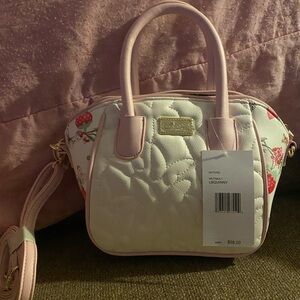 Betsey Johnson crossbody bag. Butterfly stitching. Strawberry pattern.